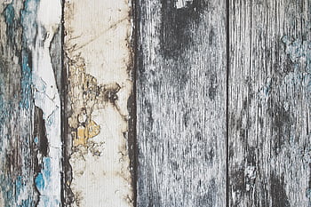 Close-up of rustic weathered wooden planks with distinctive texture and aging patterns. HD wallpaper