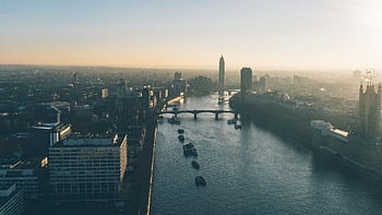 Aerial perspective of London's skyline with the River Thames at sunrise. HD wallpaper