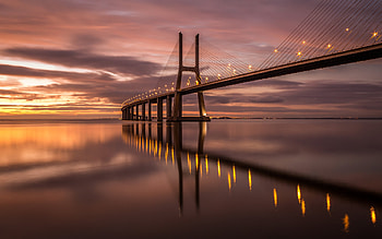 Vasco de Gama Bridge, bridge, water, vasco de gama, sunset HD wallpaper
