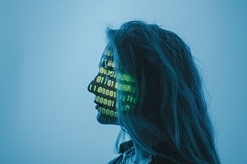 Silhouette of a woman with binary code projected on her face in a digital concept setting. HD wallpaper