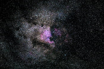 Captivating of a vibrant nebula filled with stars in the expansive universe. HD wallpaper