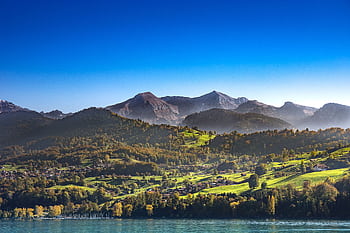 Breathtaking landscape of Spiez with Swiss Alps and Lake Thun in the backdrop. Ideal for nature enthusiasts. HD wallpaper