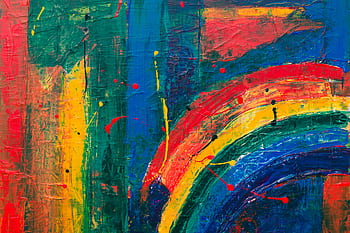 Colorful abstract painting featuring a vibrant rainbow splash on canvas. HD wallpaper