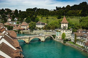 Aerial shot of Untertorbrücke bridge over the Aare River in Bern, Switzerland, with historic buildings. HD wallpaper