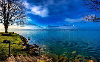 Lake at Early Spring, dust, trees, clouds, sky, mountains, water HD wallpaper