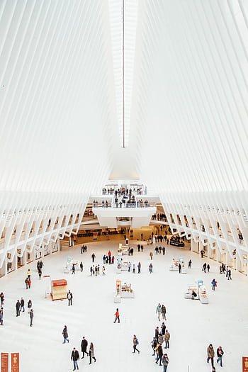 The majestic interior of the World Trade Center Oculus in NYC with people milling about, captured from above. HD phone wallpaper