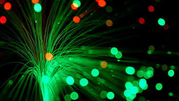 Subscription Library Green and red fiber optics strands moving against a black background. HD wallpaper