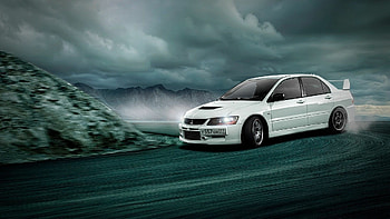 Lancer Evo 9, Rally-inspired masterpiece, Uncompromising performance, Unforgettable presence HD wallpaper