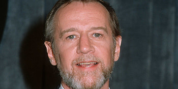 George Carlin, Comedy genius, Memorable performances, Unfiltered humor HD wallpaper