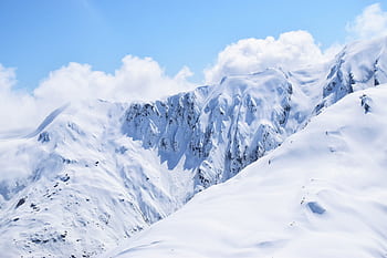 Stunning snowy mountains under a bright blue sky in Gimmerburn, New Zealand. HD wallpaper