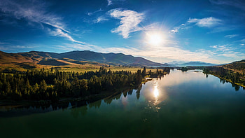 Sun rising over the Flathead River, Montana, hills, reflection, landscape, clouds, sky, water, usa HD wallpaper