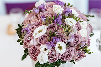 Elegant bridal bouquet featuring pastel roses and lisianthus, perfect for weddings and romantic occasions. HD wallpaper