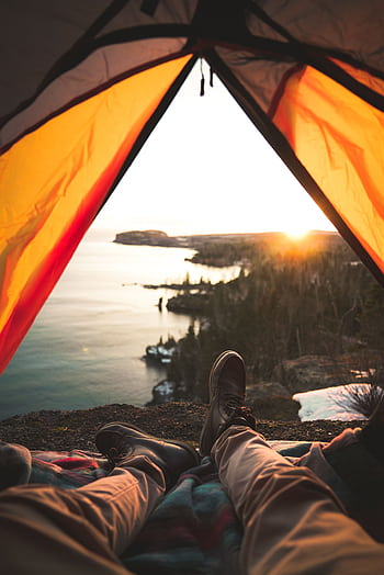 Relaxing in a tent with a breathtaking view of Lake Superior at sunset in Duluth, MN. HD phone wallpaper