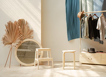 Explore a serene minimalist room with natural wooden decor, perfect for inspiration. HD wallpaper