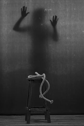 A dark, enigmatic with a shadowy figure, capturing a surreal and dramatic mood. HD phone wallpaper