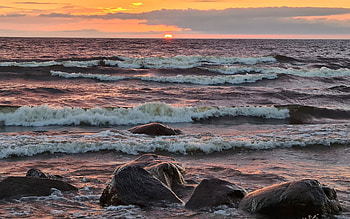 Wavy Sea in Latvia, sea, waves, Latvia, rocks, sunset HD wallpaper