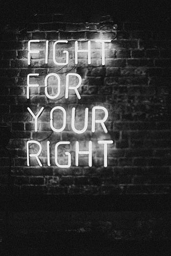 Monochrome neon sign on brick wall with slogan 'Fight for Your Right.' Perfect for motivation and urban themes. HD phone wallpaper