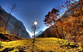Mountain sun, sunny, colorful, glow, colors, nice, bright, shine, autumn, sun, slopes, fall, beautiful, grass, mountain, leaves, cliffs, pretty, light, clouds, nature, sky, lovely, foliage HD wallpaper