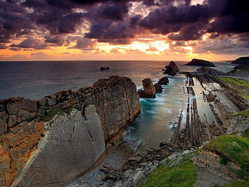 Natural Dam, sea, sky, grass, sun, sunset, rock, cloud HD wallpaper