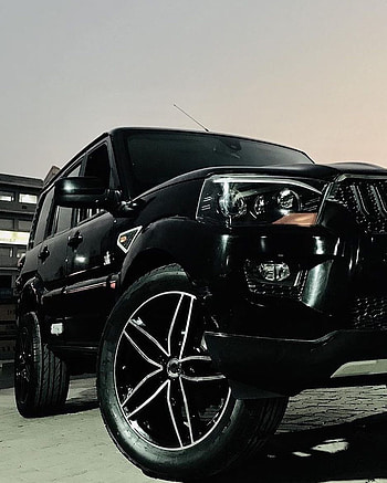 may contain: car, sky and outdoor. Scorpio car, Mahindra, Black Scorpio Car HD phone wallpaper