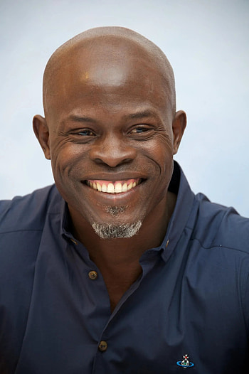Djimon Hounsou, Handsome black actor, Eye-catching appearance, Charismatic presence HD phone wallpaper