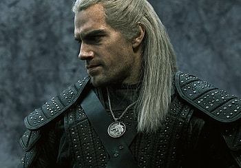 The Witcher medallion, Henry Cavill's stunning portrayal, Mutant hero, Netflix series HD wallpaper