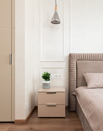 Modern beige bedroom with stylish decor, featuring soft textiles and natural lighting. HD phone wallpaper