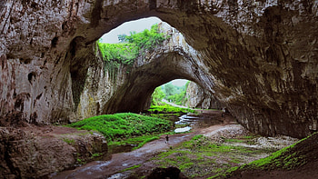massive cave in bulgaria, holes, cave, grass, rocks HD wallpaper