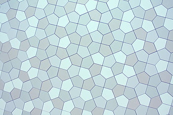 Blue and gray abstract geometric pattern with hexagonal tiles, perfect for modern backgrounds. HD wallpaper
