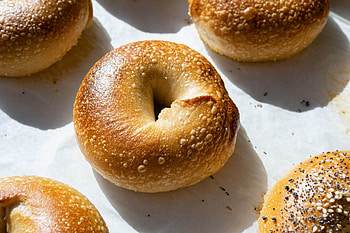 Sourdough bagel, Artisanal creation, Perfectly textured, Rustic goodness HD wallpaper