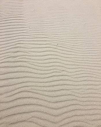 Textured ripples in sand at the beach in Nida, Lithuania, offering a serene summer background. HD phone wallpaper