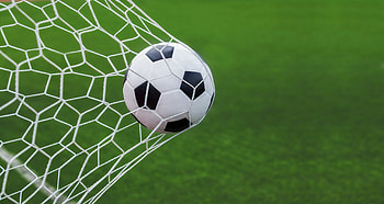Football soccer ball in goal, Striker's glory, Net's triumph, Sportsmanship captured HD wallpaper