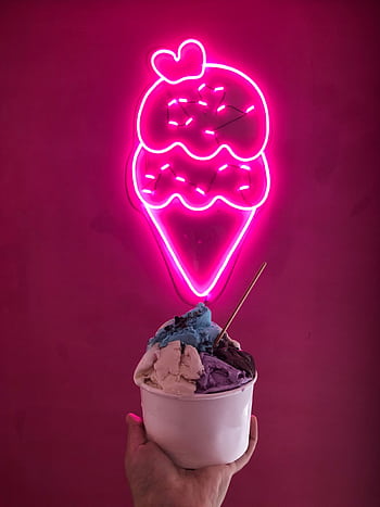 Multicolor ice cream in a cup below a neon ice cream sign, set against a pink background. HD phone wallpaper