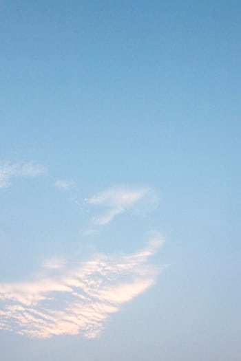 Tranquil sky featuring light clouds against a clear blue backdrop. HD phone wallpaper