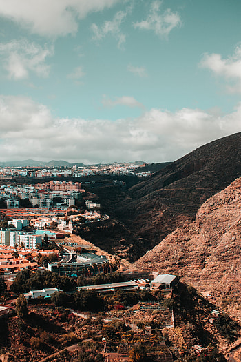Cities, Architecture, City, Building, Rocks, Slope HD phone wallpaper