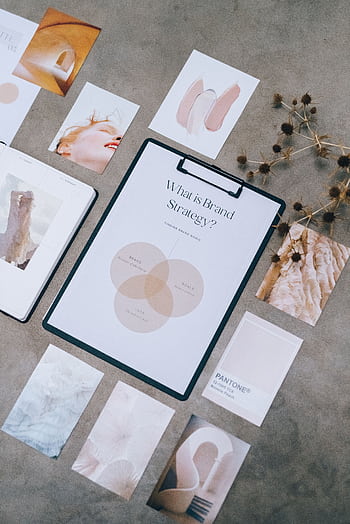 Aesthetic flat lay of branding and design documents on textured surface. HD phone wallpaper