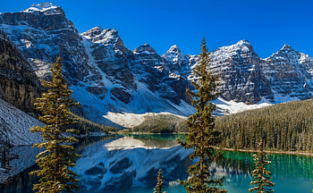 Landscape with mountain and lake, mirror, landscape, beautiful, rocks, serenity, mountain, lake, shore, reflection, cliffs, snow, trees HD wallpaper