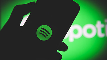 Advertising revenue growth, Spotify podcast push, Marketing success, Media analysis HD wallpaper