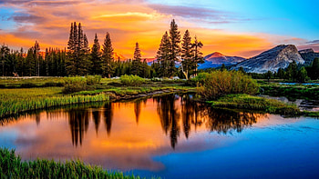 Mountain and lake at sunset, tranquility, landscape, beautiful, grass, serenity, mountain, lake, reflection, trees, sky, amazing, calmness, sunset HD wallpaper