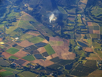 Aerial landscape of diverse farmlands and countryside near Cape Town, showcasing agricultural patterns. HD wallpaper