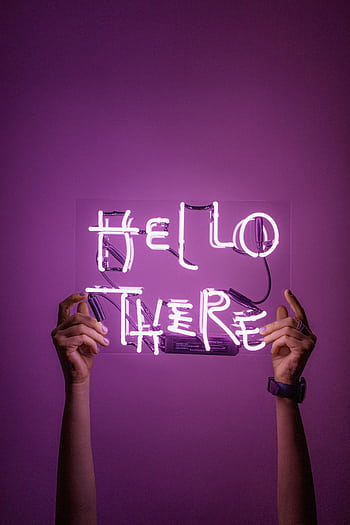 Bright neon sign saying 'Hello There' held by hands against a purple background. HD phone wallpaper