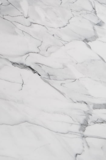 Close-up of elegant white marble texture with gray veining, perfect for design and decoration concepts. HD phone wallpaper