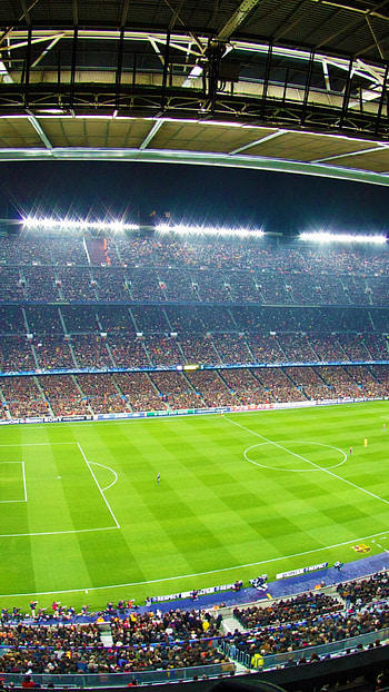 High-intensity match, Soccer ball close-up, Player teamwork, Exciting sports moment HD phone wallpaper