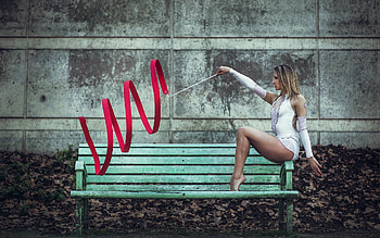 Focused girl, Gymnastics pose, Taped equipment, Bench section HD wallpaper