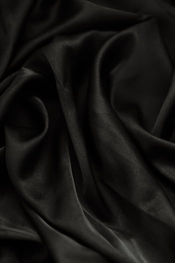Close-up of smooth rippled black fabric, perfect for backgrounds or textiles. HD phone wallpaper