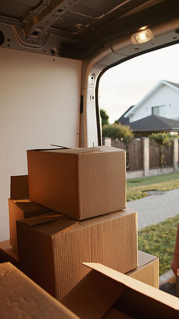 View inside a delivery van with stacked cardboard boxes ready for moving. HD phone wallpaper