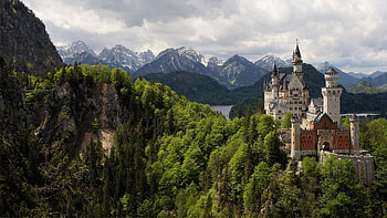 Neuschwanstein Castle, bavaria, lake, scenery, films, turrets, movies, germany, chitty chitty bang bang, great escape, castle, mountains, sleeping beauty HD wallpaper