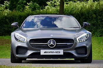 Front view of a luxury Mercedes-Benz AMG against a natural backdrop. HD wallpaper