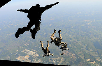 Adrenaline-filled skies, Soaring from above, Aerial maneuvers, Skydiving sensations HD wallpaper
