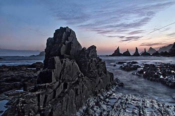 Coast, dark, rocks, sunset, sea, nature HD wallpaper